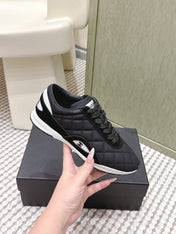 CHANEL 25S SNEAKERS IN BLACK CALFSKIN AND SUEDE