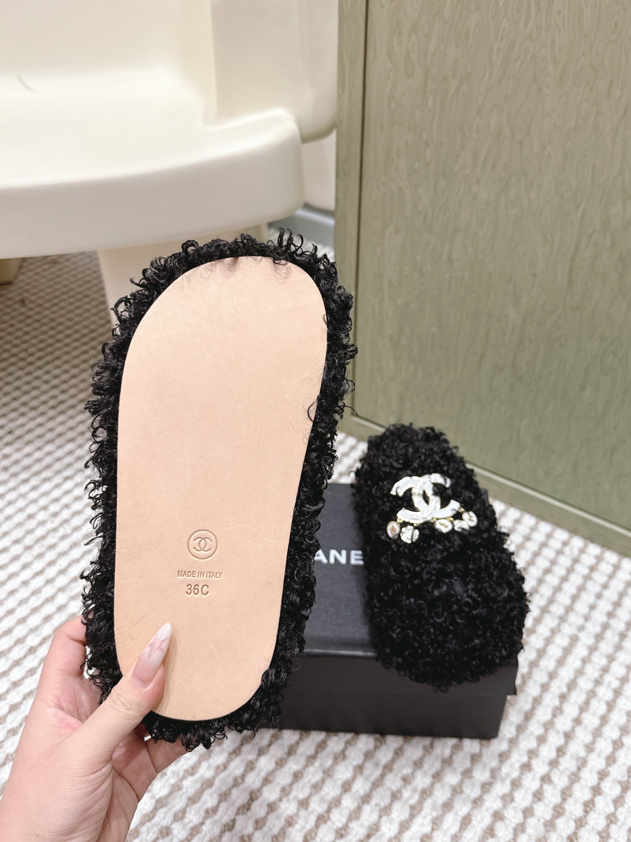 CHANEL 25S CLASSIC FURRY SLIDES IN BLACK WITH DOUBLE C LOGO