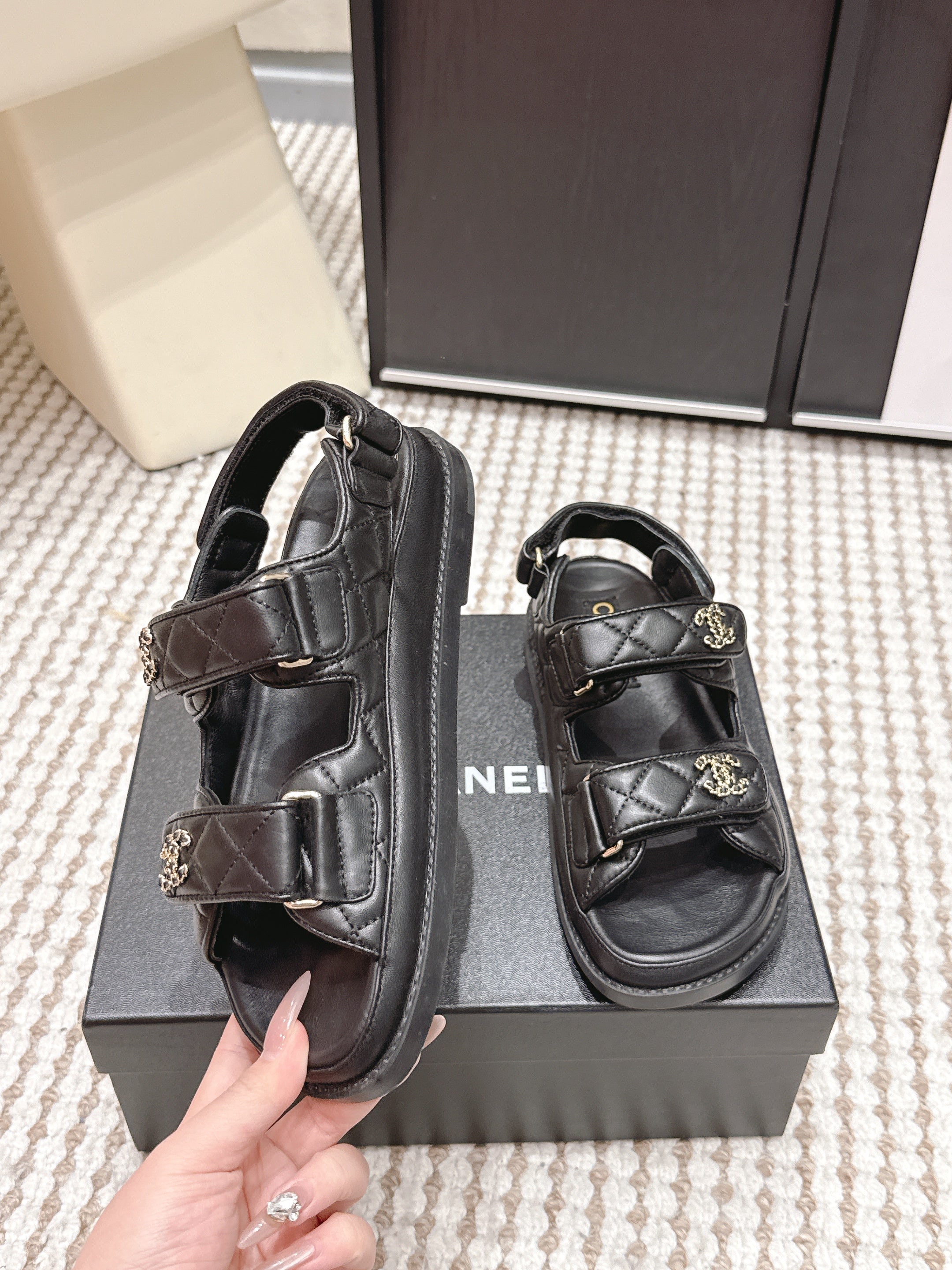 CHANEL 26S QUILTED DAD SANDALS IN BLACK CALFSKIN