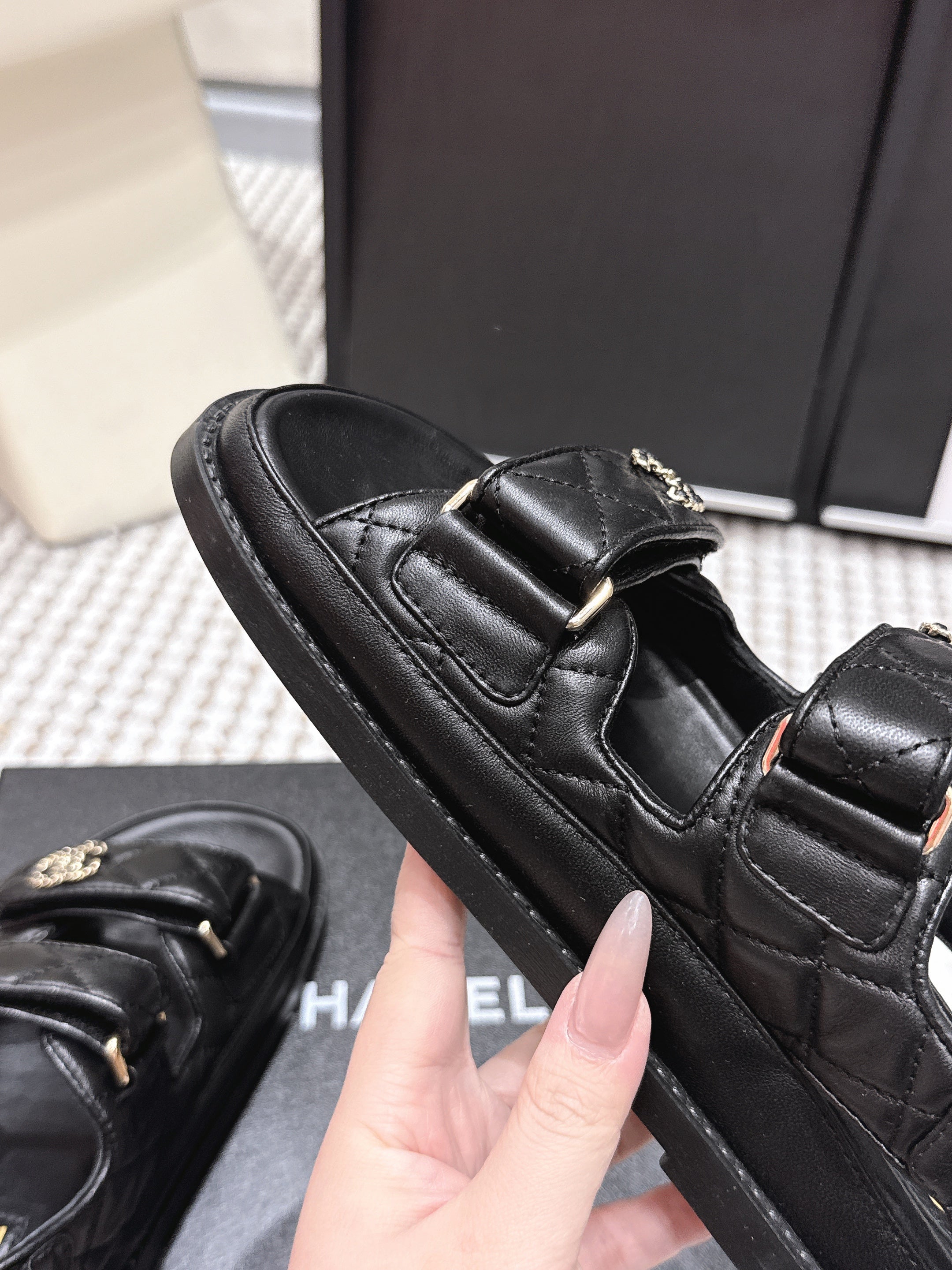 CHANEL 26S QUILTED DAD SANDALS IN BLACK CALFSKIN