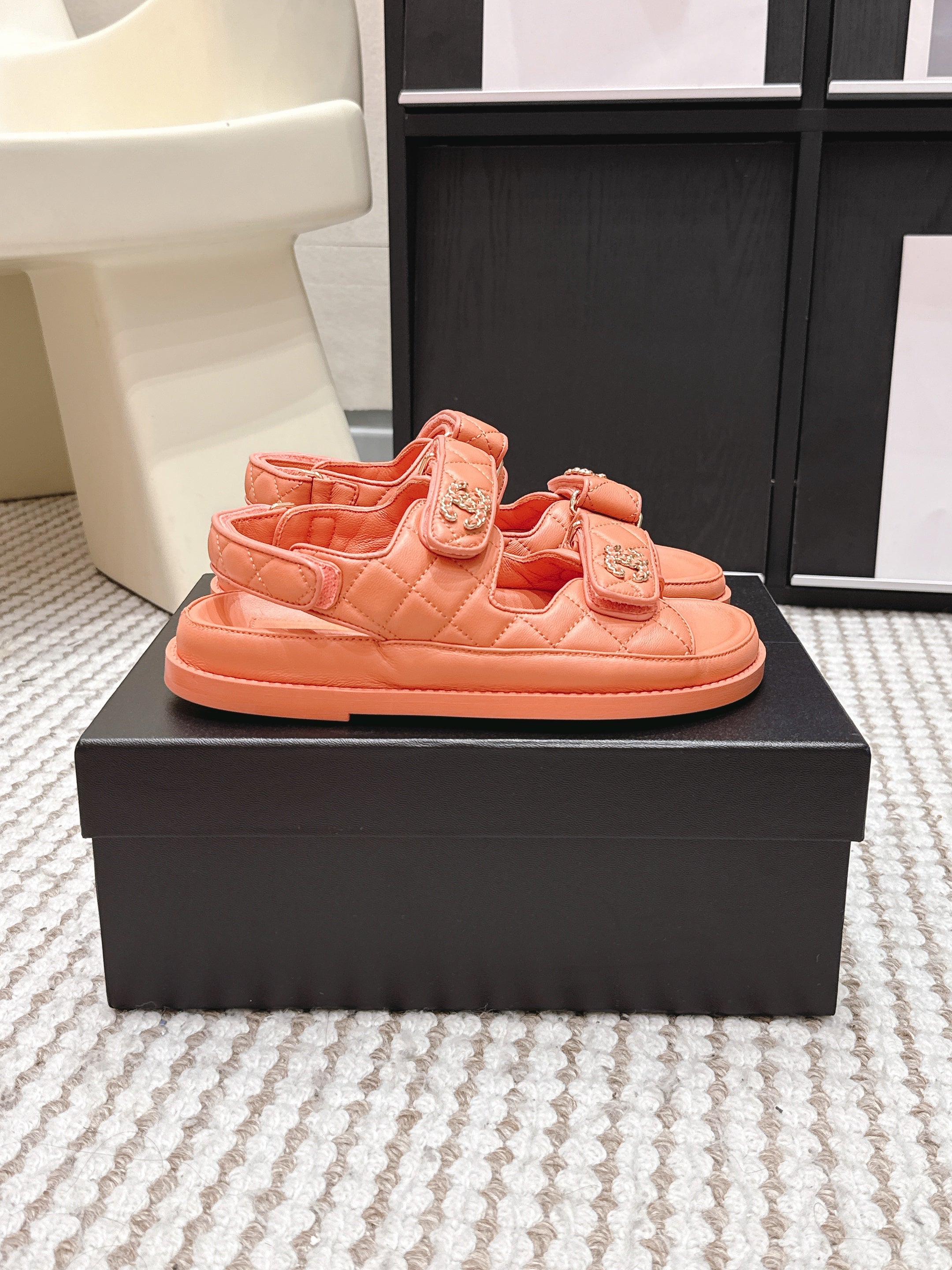 CHANEL 26S QUILTED DAD SANDALS IN ORANGE CALFSKIN