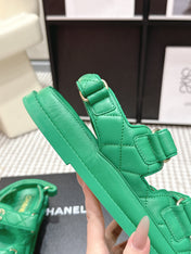 CHANEL 26S QUILTED DAD SANDALS IN GREEN CALFSKIN