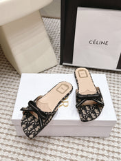 DIOR 26S FLAT SANDAL IN BLACK DIOR OBLIQUE JACQUARD WITH BOW