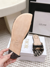 DIOR 26S FLAT SANDAL IN BLACK DIOR OBLIQUE JACQUARD WITH BOW