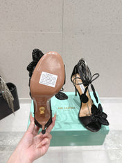 AQUAZZURA 26S FLORAL HEELS 100 MM IN BLACK WOVEN RAFFIA