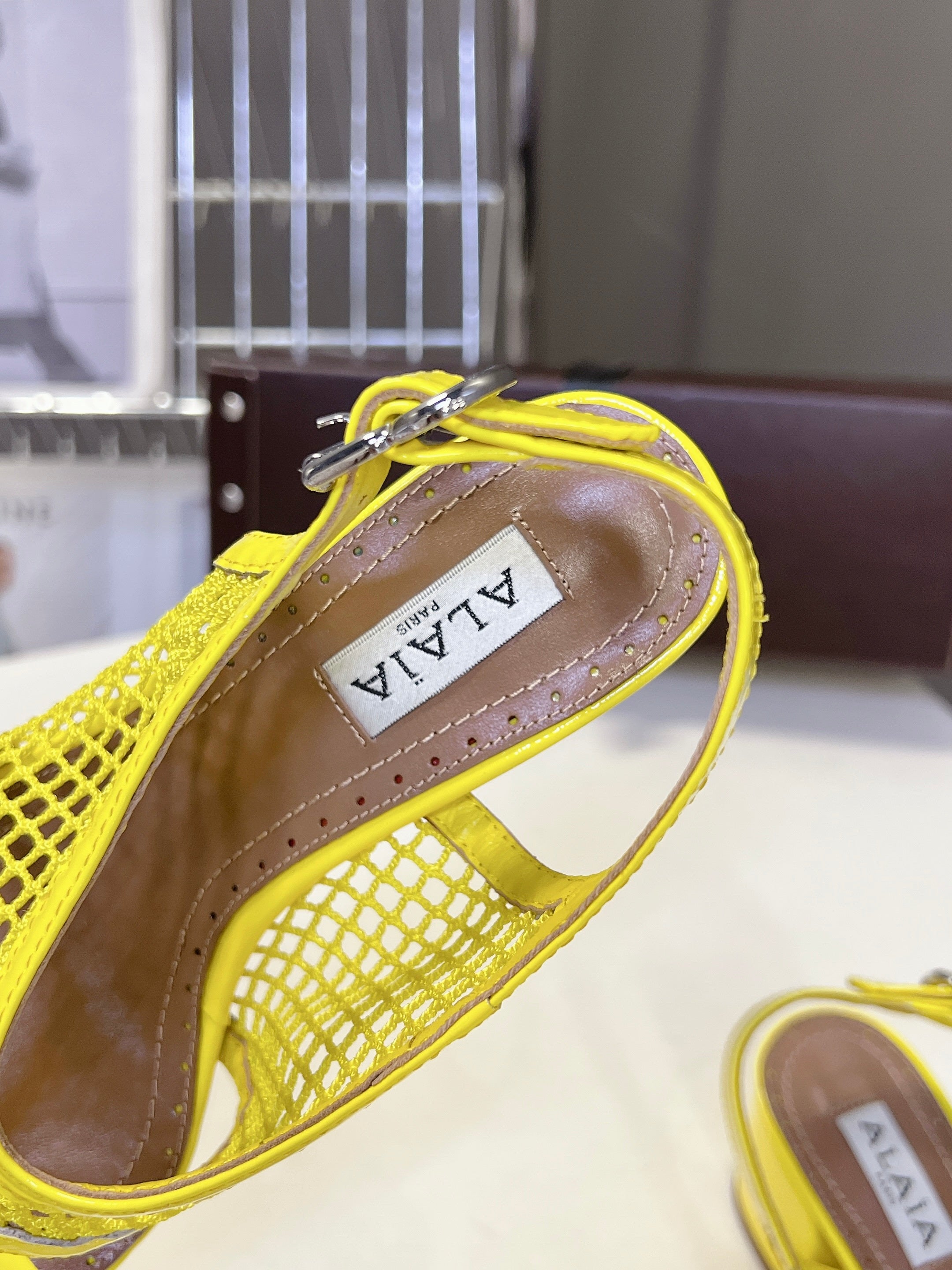 ALAIA 26S MESH THONG HEELS 55 MM IN YELLOW PATENT CALFSKIN
