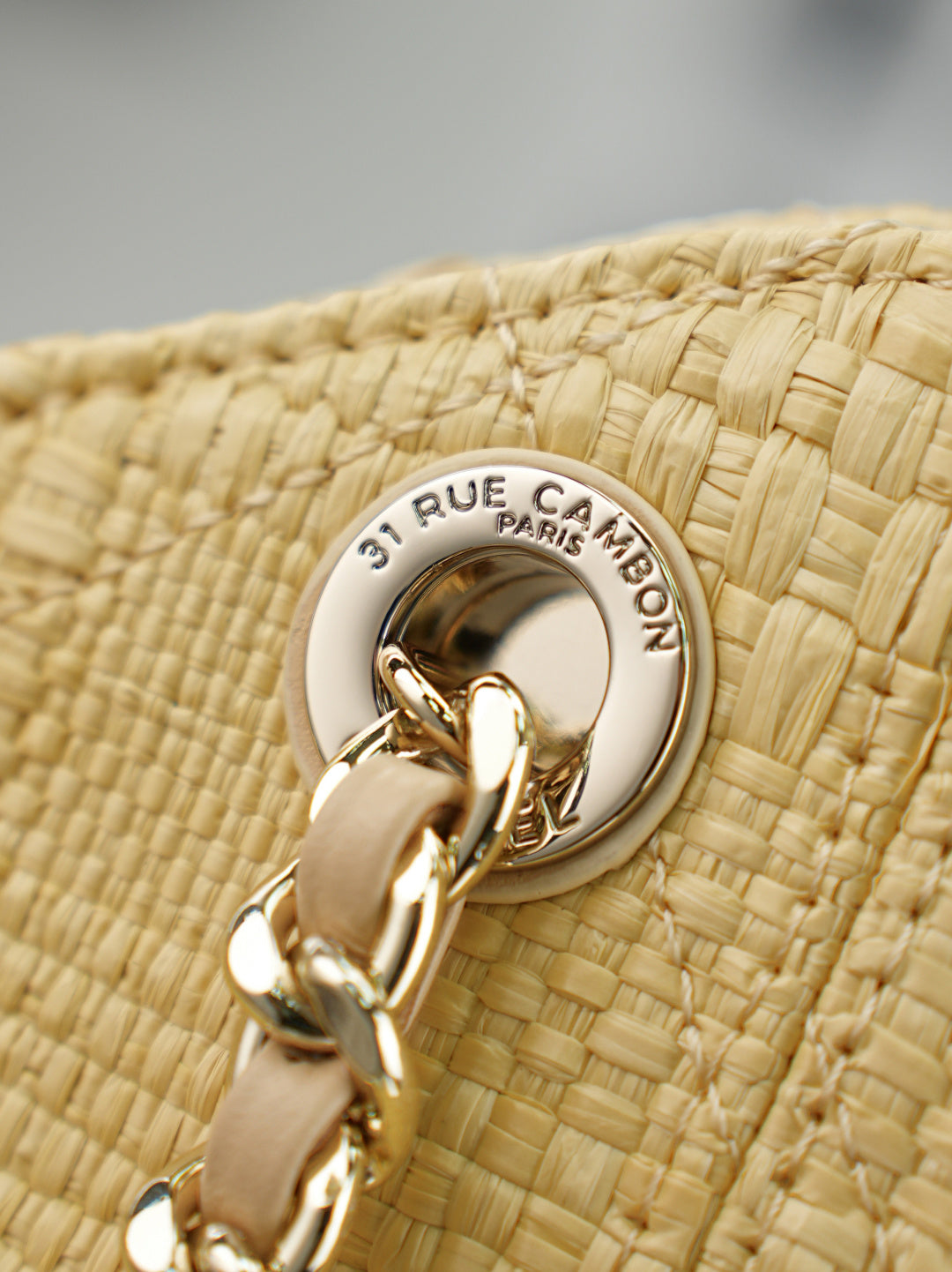 CHANEL 25S SHOULDER BAG 32 IN NATURAL RAFFIA AND CALFSKIN GOLD HARDWARE