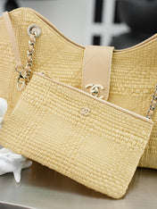 CHANEL 25S SHOULDER BAG 32 IN NATURAL RAFFIA AND CALFSKIN GOLD HARDWARE