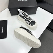CHANEL 26S CHUNKY SNEAKERS IN BLACK AND WHITE CALFSKIN