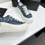 CHANEL 26S SNEAKERS IN NAVY BLUE DIAMOND-PATTERNED WOVEN FABRIC