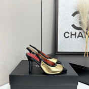 CHANEL 26S HIGH HEEL SLINGBACK IN GOLD LAMBSKIN AND BLACK PATENT CALFSKIN