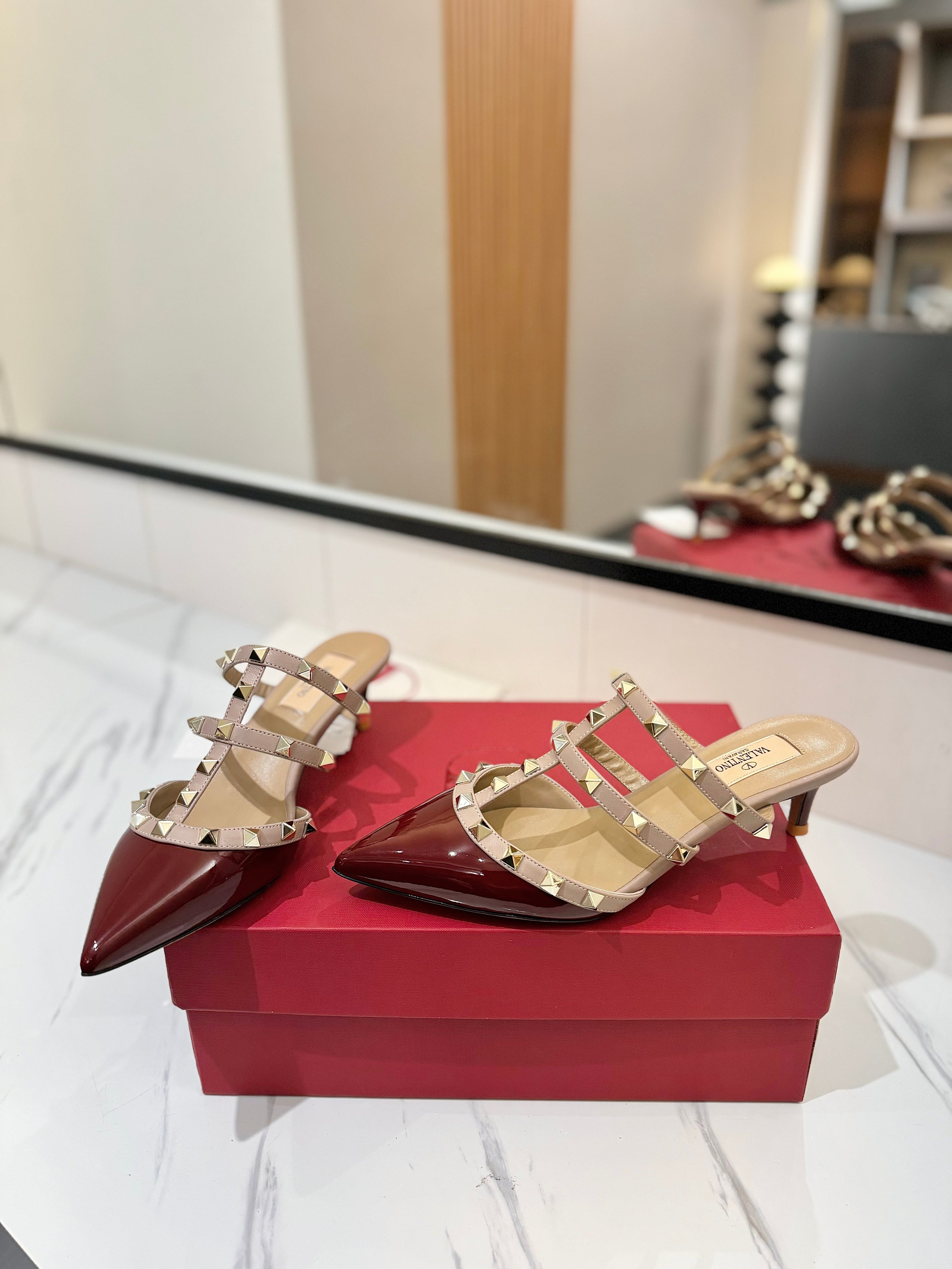 VALENTINO 26S STUDDED HEELED MULES 50 MM IN DARK RED PATENT CALFSKIN