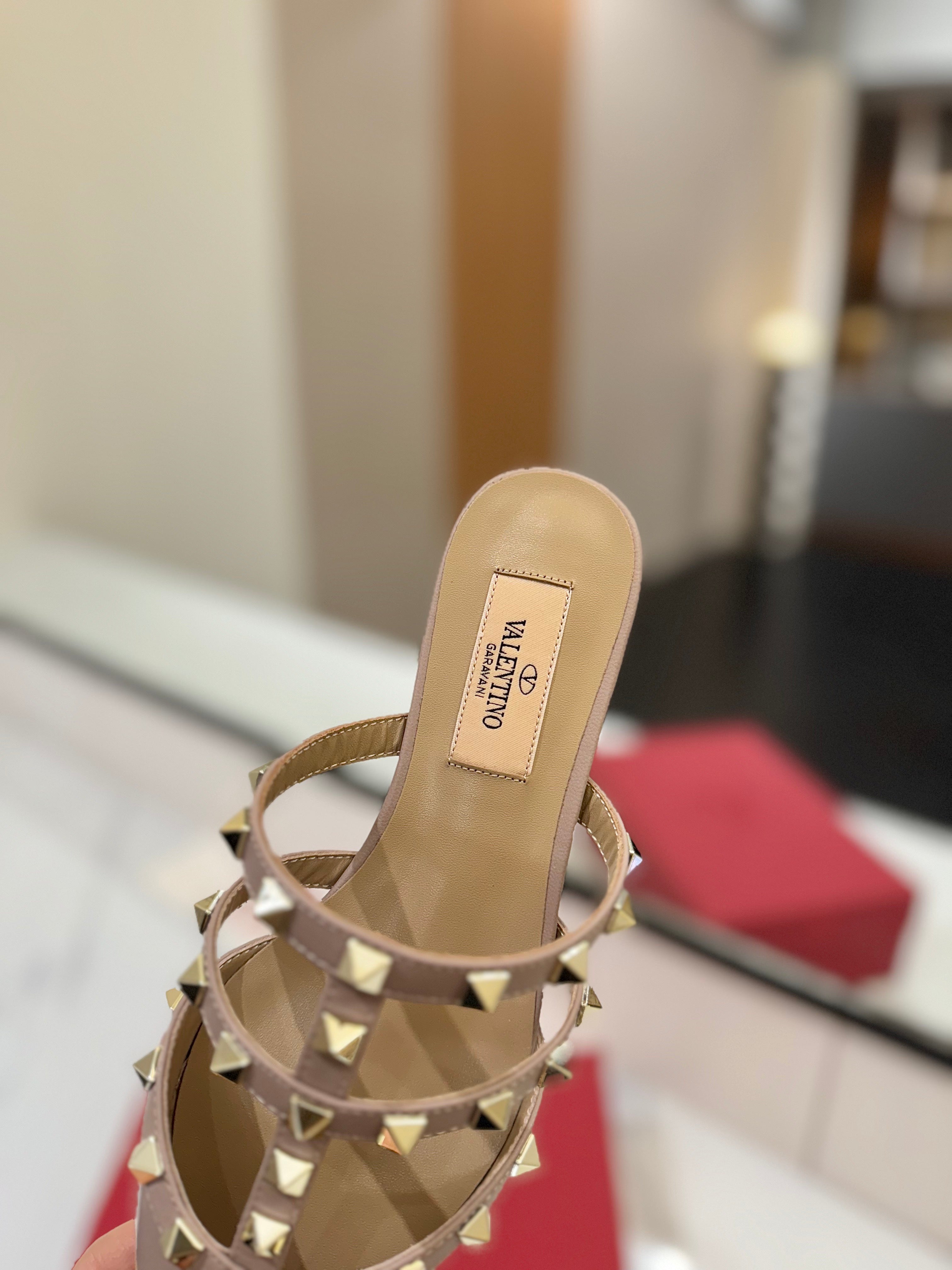 VALENTINO 26S STUDDED FLAT MULES IN NUDE PATENT CALFSKIN