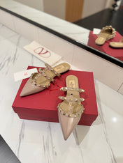 VALENTINO 26S STUDDED FLAT MULES IN NUDE PATENT CALFSKIN