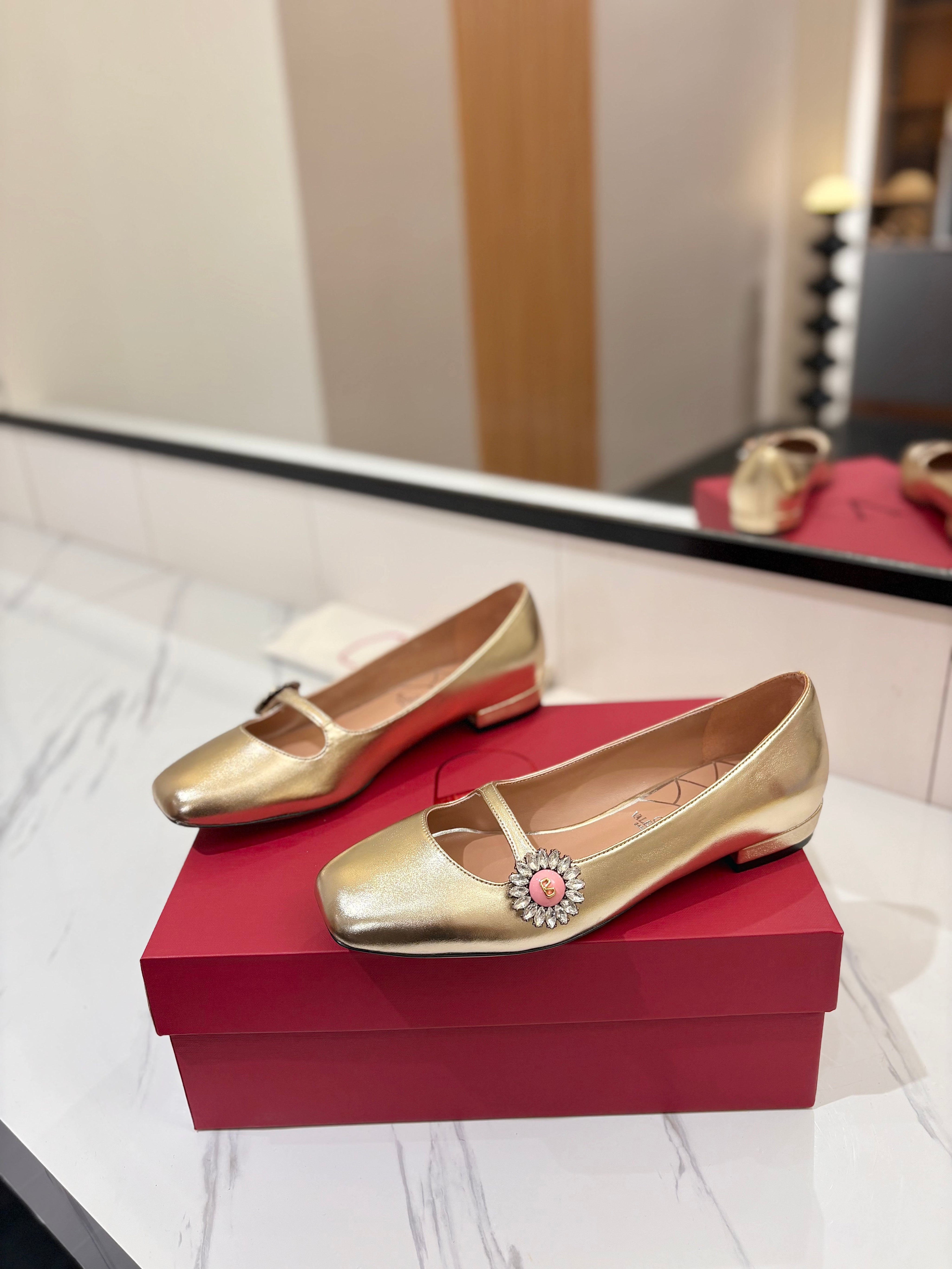 VALENTINO 26S MARY JANE FLATS IN METALLIC GOLD CALFSKIN WITH CRYSTAL FLOWER