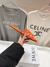 LOEWE 26S PETAL ANAGRAM SLIDE IN BURNT ORANGE CALFSKIN