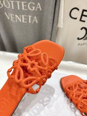 LOEWE 26S PETAL ANAGRAM SLIDE IN BURNT ORANGE CALFSKIN