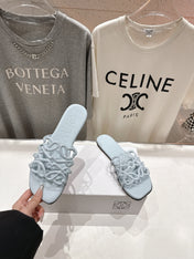 LOEWE 26S PETAL ANAGRAM SLIDE IN LIGHT BLUE CALFSKIN