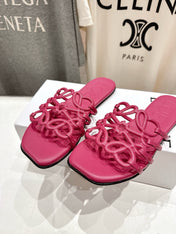 LOEWE 26S PETAL ANAGRAM SLIDE IN DARK ROSE PINK CALFSKIN