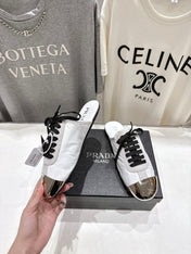 PRADA 25S MULES IN WHITE WITH METAL TOECAP