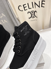 CELINE 26S BOOTS IN WHITE AND BLACK CANVAS
