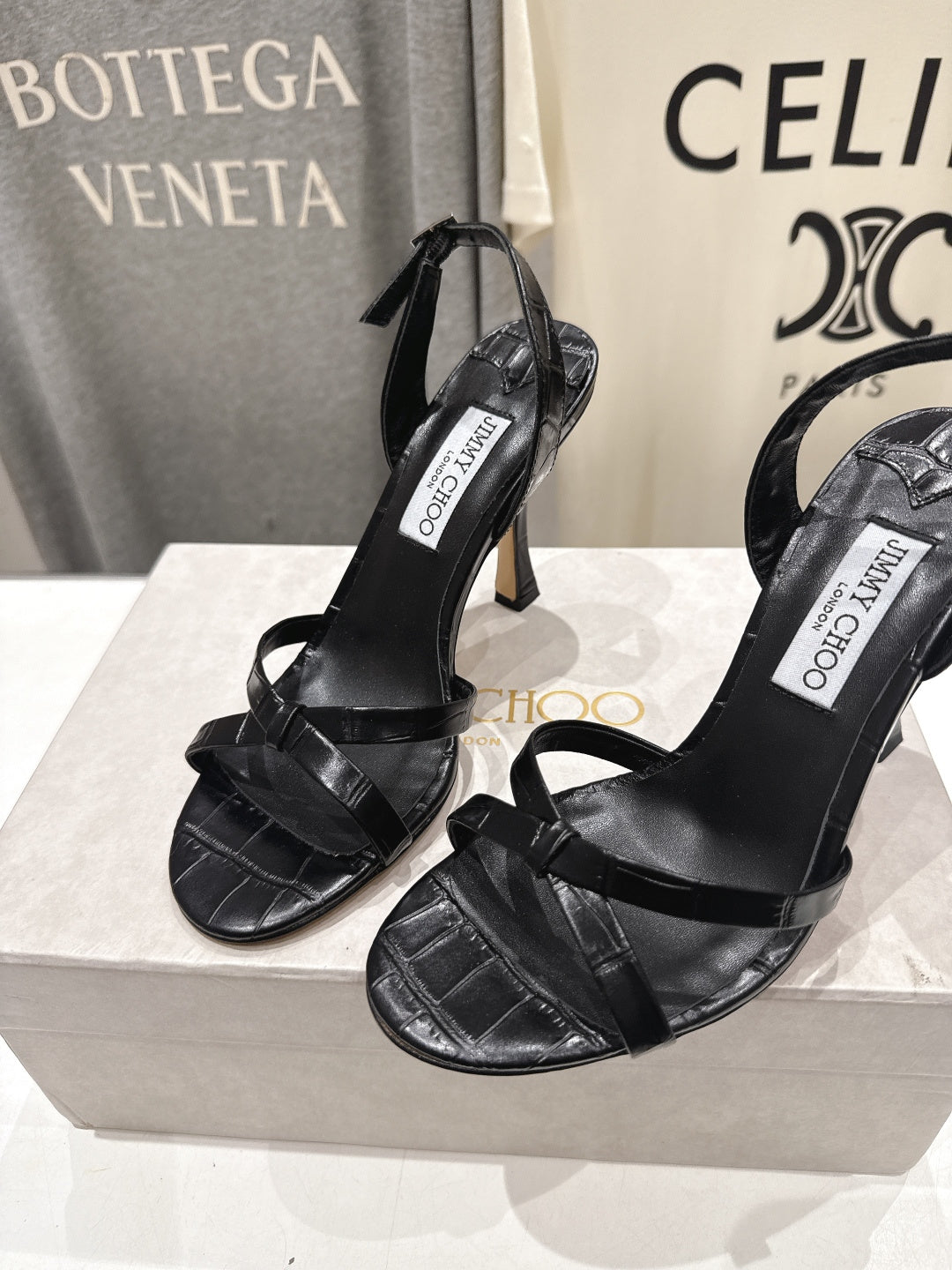 JIMMY CHOO 26S HIGH-HEELED SANDALS 100 MM IN BLACK CROC-EMBOSSED LAMBSKIN