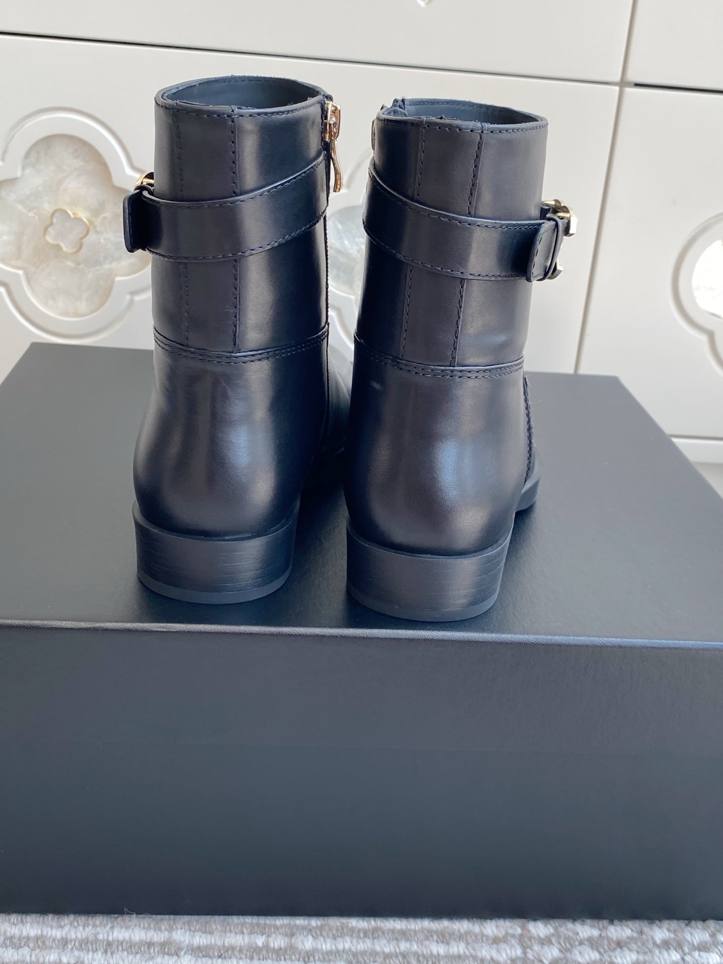 CHANEL 26S SHORT RIDING BOOTS IN BLACK CALFSKIN GOLD TONE CC LOGO BUCKLE STRAP