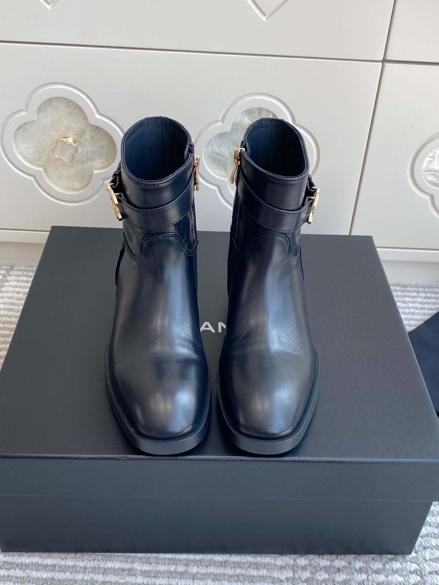 CHANEL 26S SHORT RIDING BOOTS IN BLACK CALFSKIN GOLD TONE CC LOGO BUCKLE STRAP