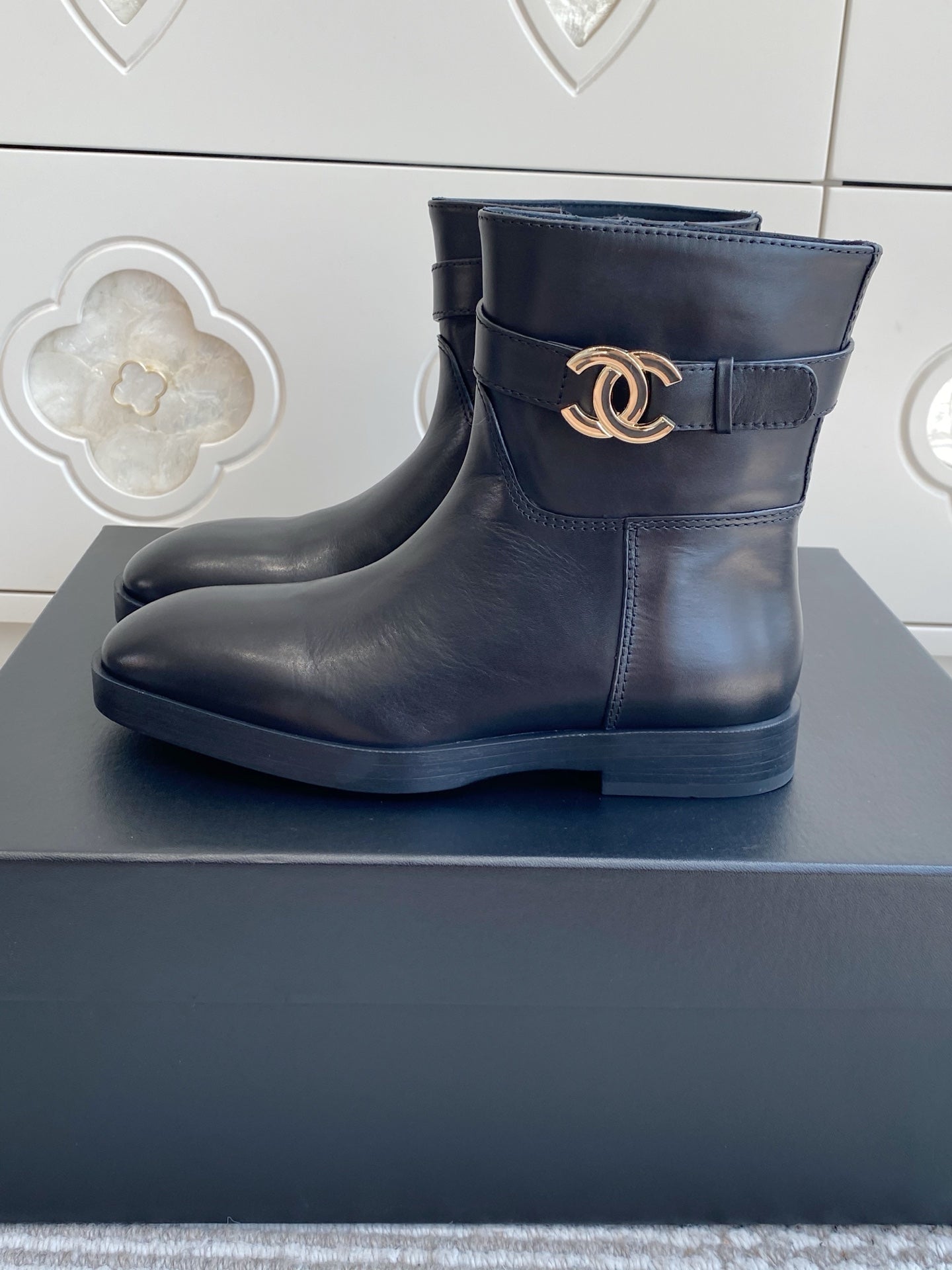 CHANEL 26S SHORT RIDING BOOTS IN BLACK CALFSKIN GOLD TONE CC LOGO BUCKLE STRAP