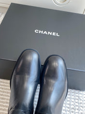 CHANEL 26S SHORT RIDING BOOTS IN BLACK CALFSKIN GOLD TONE CC LOGO BUCKLE STRAP