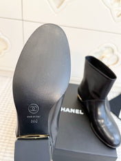 CHANEL 26S SHORT BOOTS IN BLACK CALFSKIN