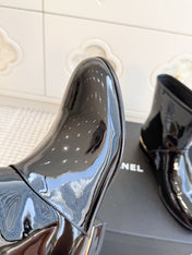 CHANEL 26S SHORT BOOTS IN BLACK PATENT LEATHER