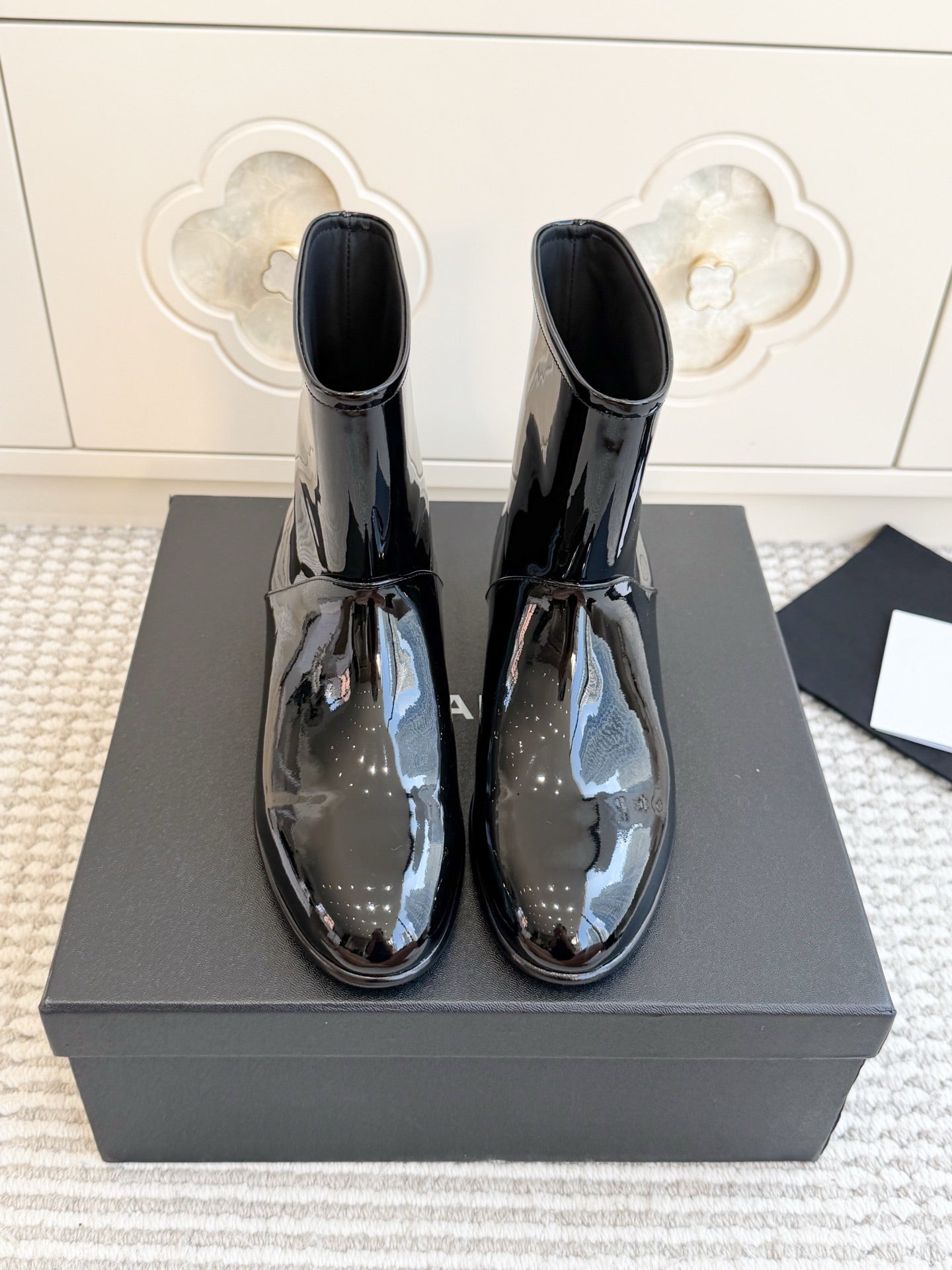 CHANEL 26S SHORT BOOTS IN BLACK PATENT LEATHER
