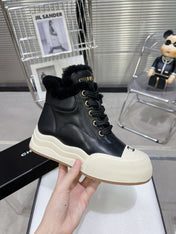 MARTIN BOOTS IN BLACK CALFSKIN AND LAMB FUR LINING