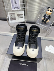 MARTIN BOOTS IN BLACK CALFSKIN AND LAMB FUR LINING