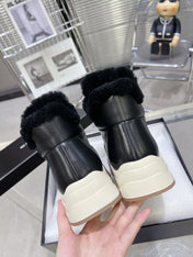 MARTIN BOOTS IN BLACK CALFSKIN AND LAMB FUR LINING