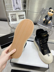 MARTIN BOOTS IN BLACK CALFSKIN AND LAMB FUR LINING