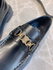 CHANEL 25S ARC DE TRIOMPHE LOAFERS IN BLACK SHINY CALFSKIN GOLD HARDWARE