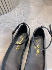 CHANEL 25S CAMELLIA SQUARE TOE FLATS IN BLACK CALFSKIN GOLD HARDWARE