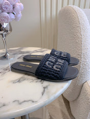 MIUMIU 26S SLIDE SANDALS IN BLACK CALFSKIN AND WOOL