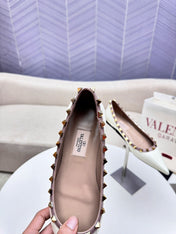 ROCKSTUD FLAT PUMP IN WHITE CALFSKIN