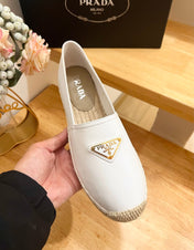 PRADA 26S LOGO ESPADRILLE SLIP ON FLATS IN WHITE CALFSKIN