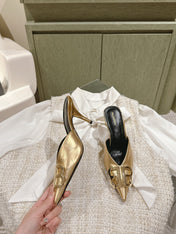 POINTED BB GOLD BUCKLE HIGH MULES IN GOLD METALLIC CALFSKIN
