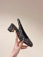 SWING SLINGBACK PUMP 55 MM IN BLACK MONOGRAM CALFSKIN