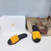 THE ROW 26S SLIDES SANDALS IN YELLOW MINK FUR AND BLACK CALFSKIN