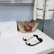 THE ROW 26S CAGE SLIDES IN IVORY WHITE SMOOTH CALFSKIN WITH BLACK FOOTBED