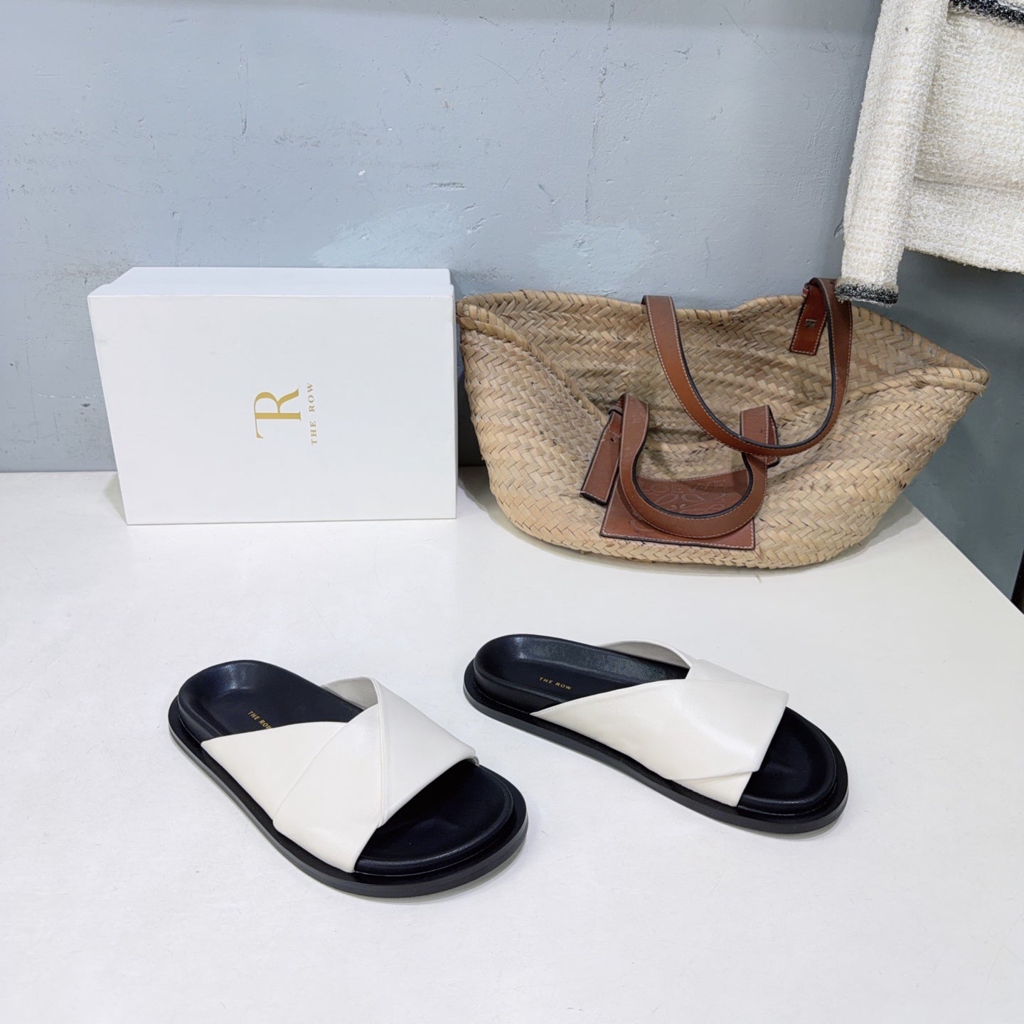 THE ROW 26S CROSS STRAP SLIDES IN IVORY WHITE CALFSKIN WITH BLACK FOOTBED