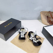 ALAIA 26S LACE-UP BALLET FLATS IN BLACK LAMBSKIN AND SUEDE