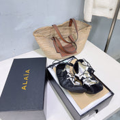 ALAIA 26S LACE-UP BALLET FLATS IN BLACK LAMBSKIN AND SUEDE