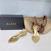 ALAIA 26S THONG SANDALS IN GOLD CALFSKIN